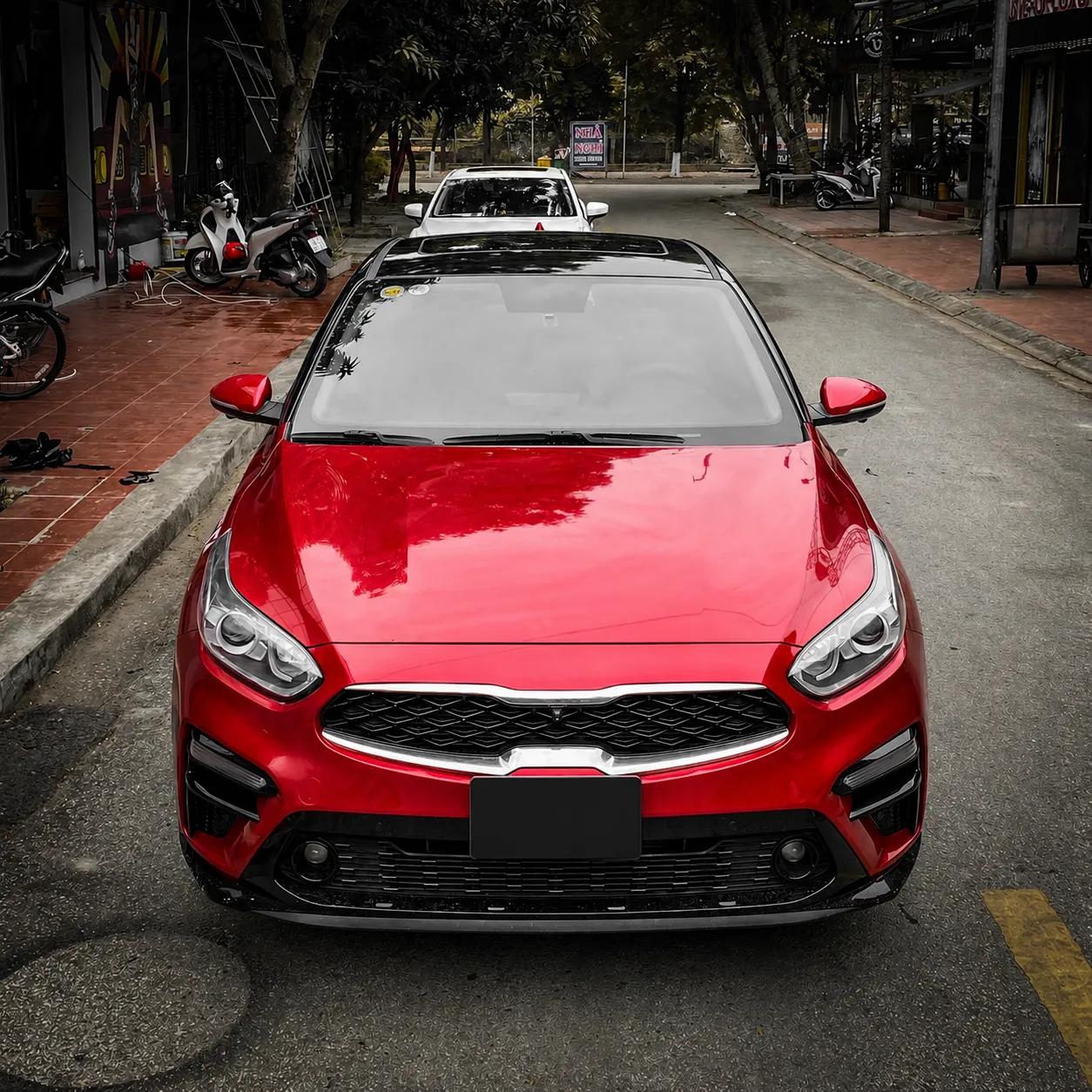 Dán nóc đen xe Kia Cerato màu đỏ